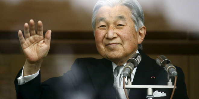 Japan's Emperor Akihito waves to well-wishers who gathered at the Imperial Palace to mark his 82nd birthday in Tokyo, Japan, December 23, 2015. REUTERS/Thomas Peter/File photo TPX IMAGES OF THE DAY